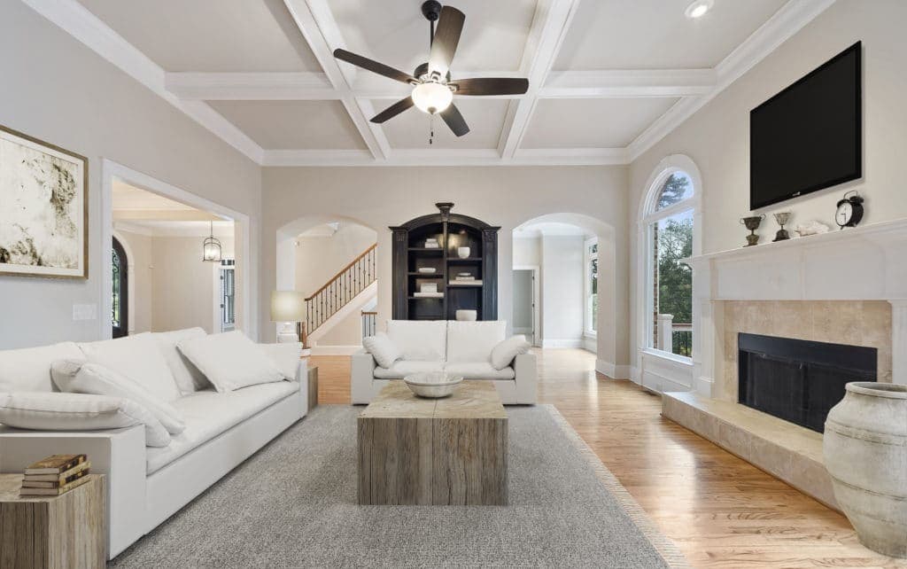 Furnished living room with AI overlays marking detected furniture and staging